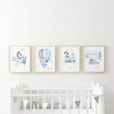 Set of 4 flying animals with zebra, elephant, raccoon, hot air balloon, airplane, airship print for toddler and boys room decor in light blue gray colors.