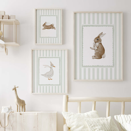 Scandinavian-style sage nursery wall decor with cute animals.

