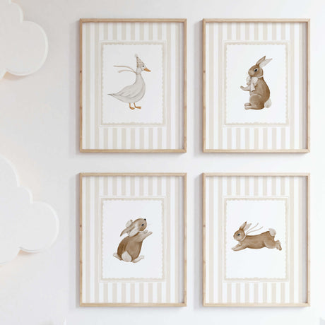 Beige nursery wall art with bunny and duck illustrations for neutral baby room.

