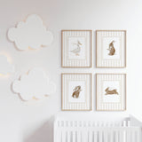 Printable animal nursery decor in beige tones with rabbit and goose artwork.