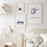 Navy blue boys nursery wall art with dump truck tractor train and airplane