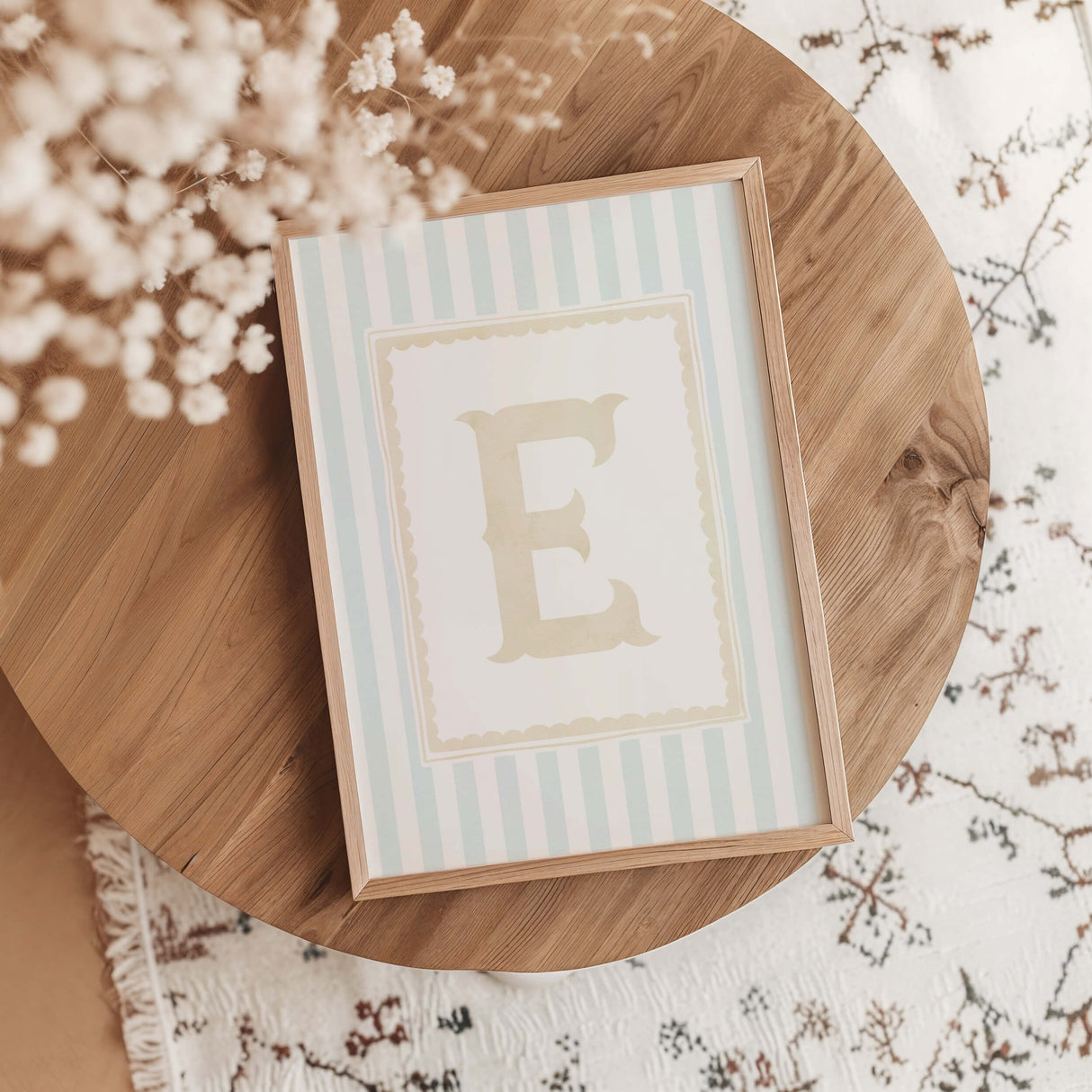 "Gender neutral nursery artwork in turquoise and warm beige tones with carousel illustrations"