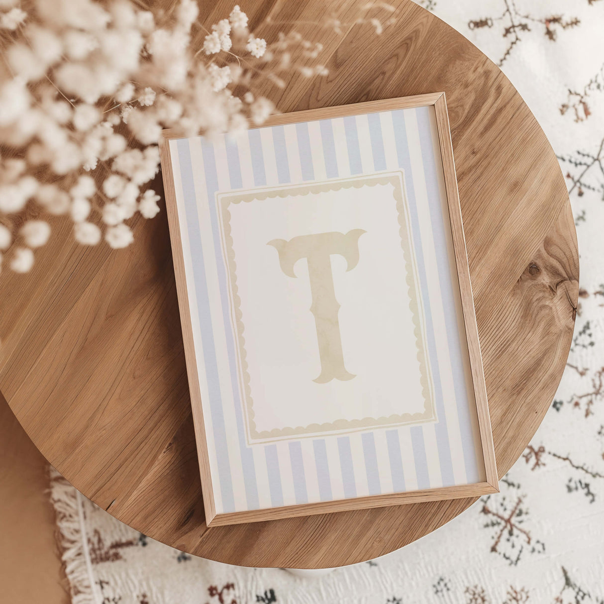 "Blue striped alphabet nursery wall art printable with beige initial letters for baby room decor"