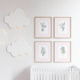 Blue flower nursery wall decor with hydrangeas on pink striped background

