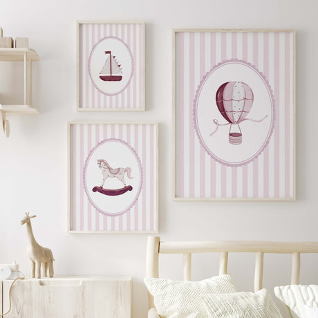 Nursery wall art printables set with sailboat rocking horse and hot air balloon in soft pink

