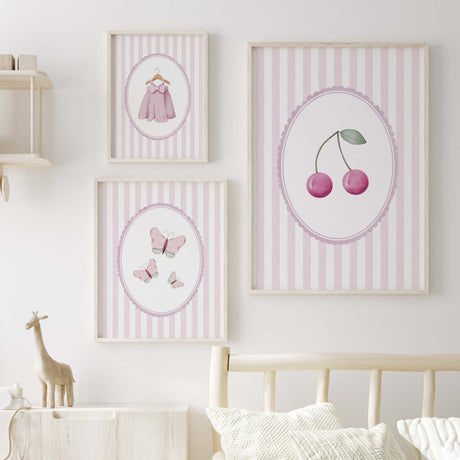 Pink nursery wall art set with cherry butterfly and baby dress prints for baby girl room
