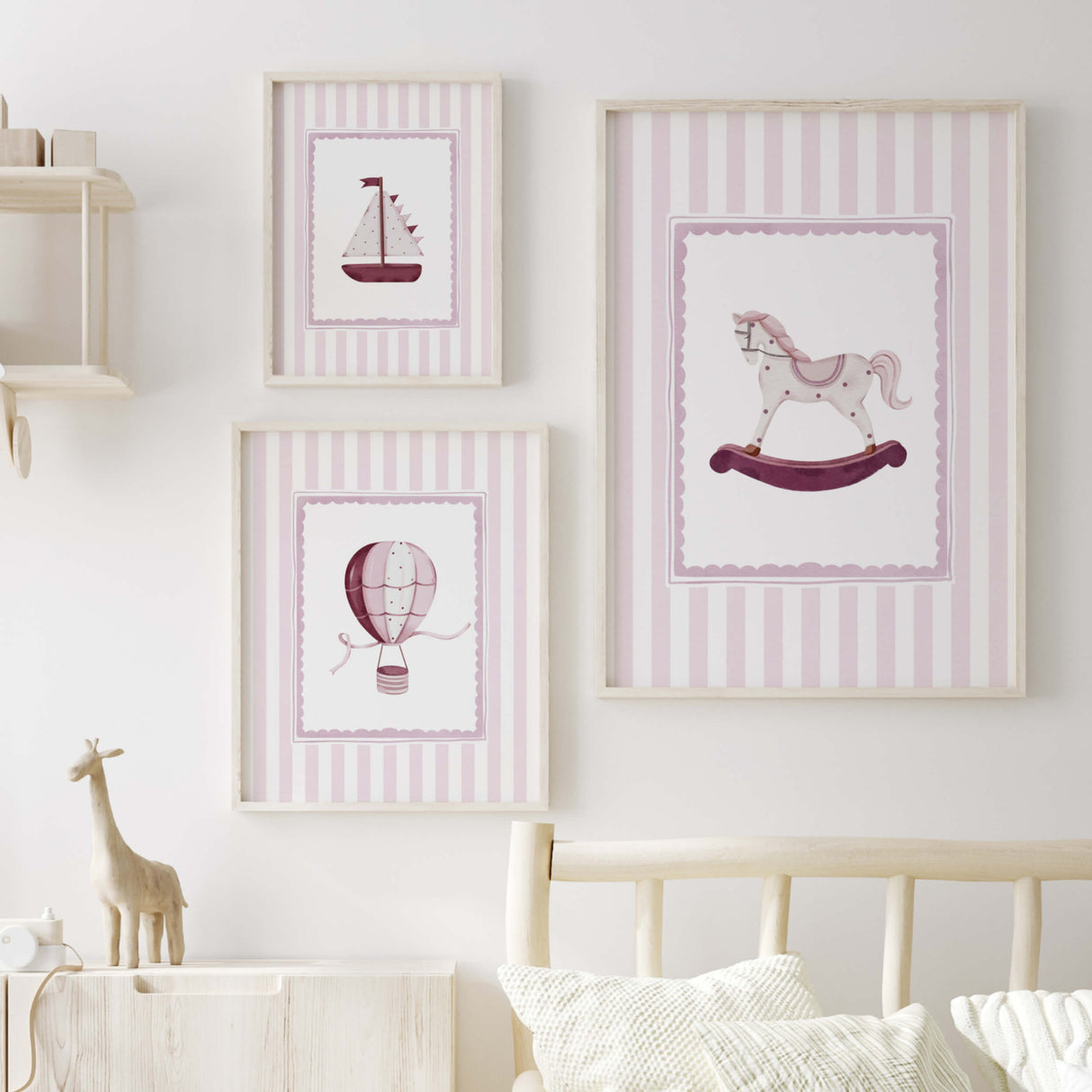 Nursery wall art printables set with sailboat rocking horse and hot air balloon in soft pink

