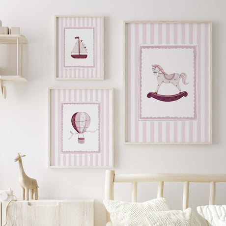 Nursery wall art printables set with sailboat rocking horse and hot air balloon in soft pink

