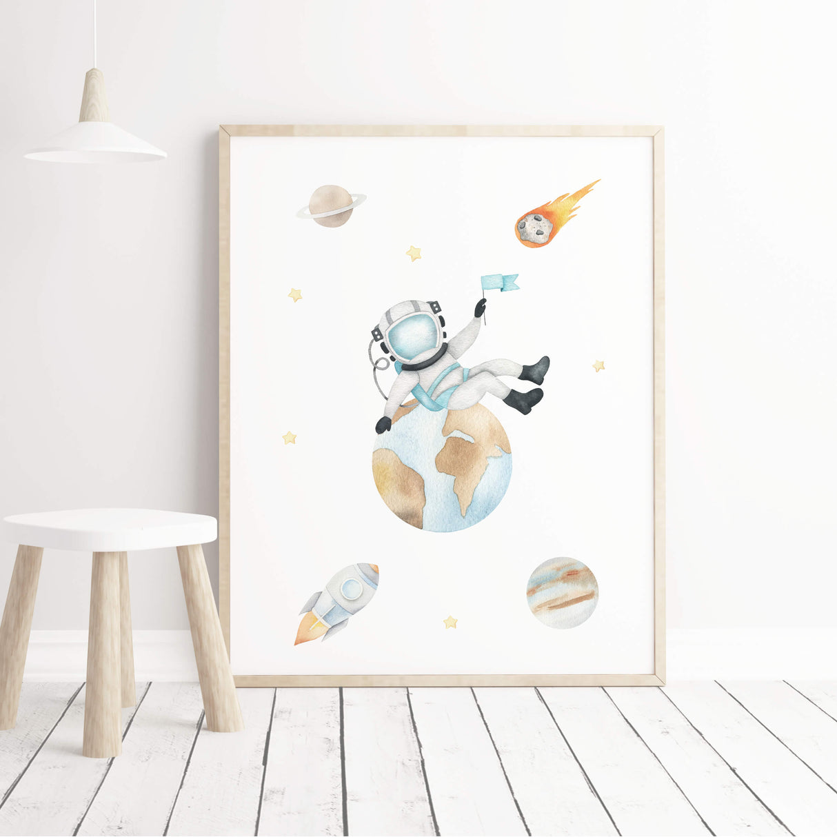 Watercolor space astronaut print with planets and moon for neutral nursery decor.