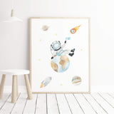 Watercolor space astronaut print with planets and moon for neutral nursery decor.