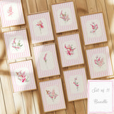 Vibrant pink botanical flower art posters in wooden frames for elegant home styling