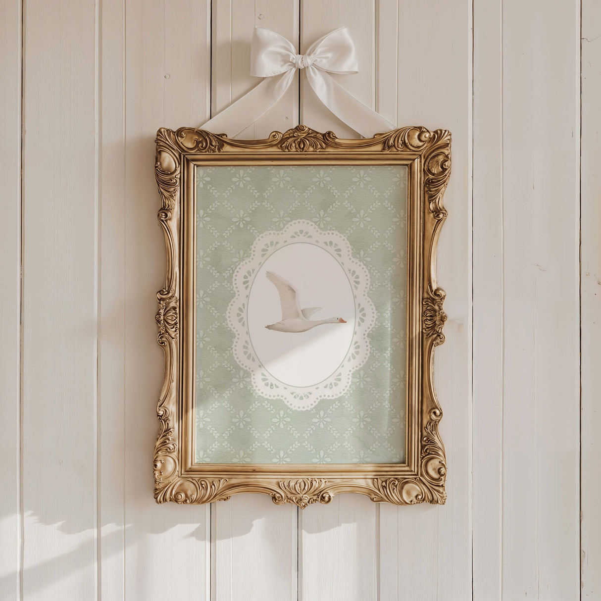Standing goose nursery art print with lace border and green floral background
