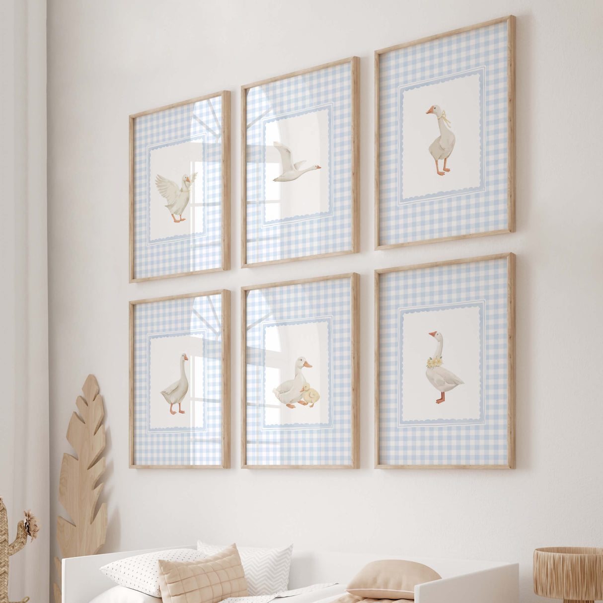 Cottagecore blue nursery decor with goose illustrations

