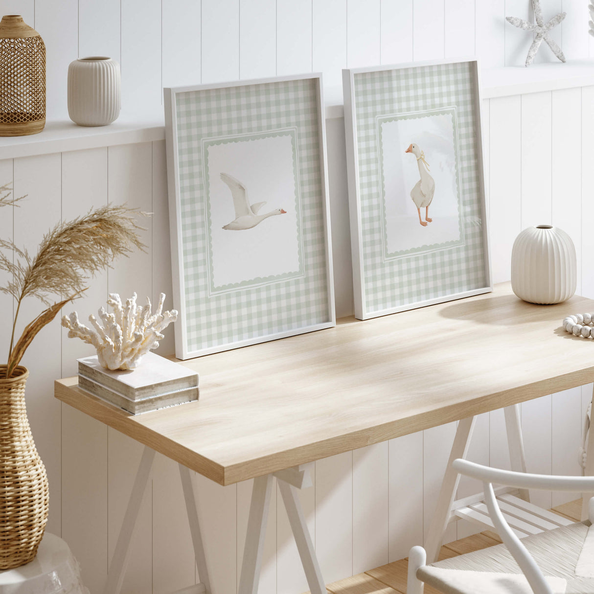 Whimsical goose wall prints in green plaid frames


