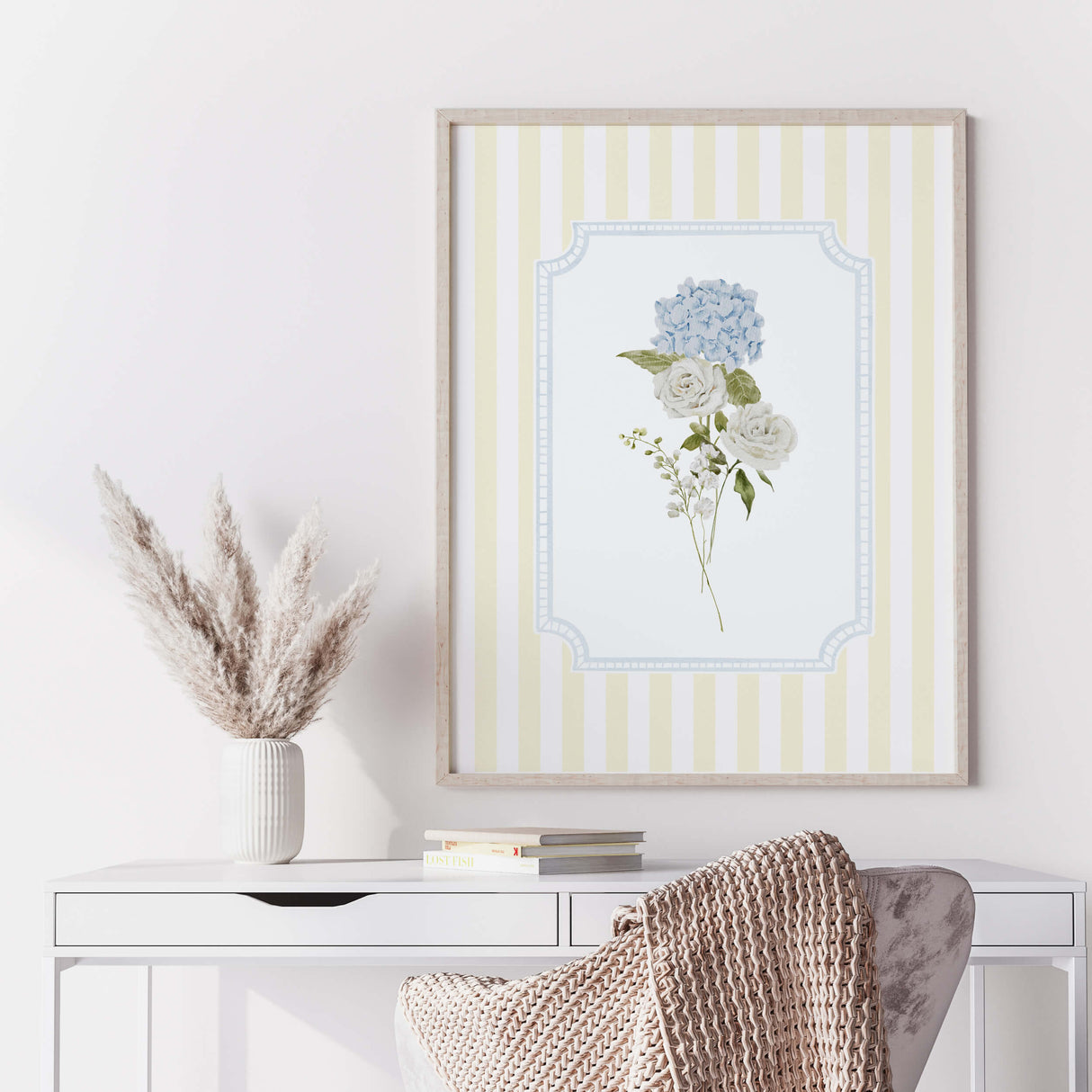 Modern floral baby room decor in soft yellow and pastel blue tones

